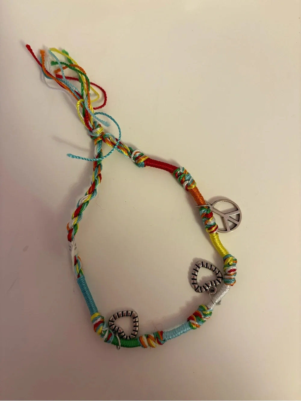 Handmade Multicolor Braided Friendship Bracelet with Peace Charm